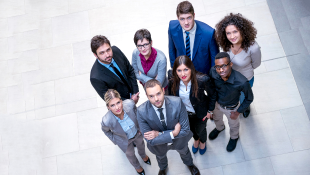 Group of business people looking up