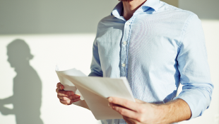 Businessman holding contract