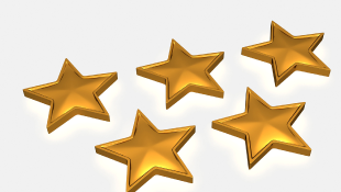 Gold stars on white background