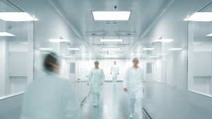 Doctors walking through hospital