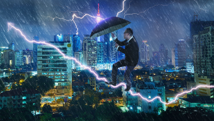 Businessman facing a storm