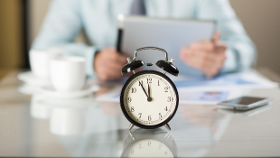 Man with alarm clock